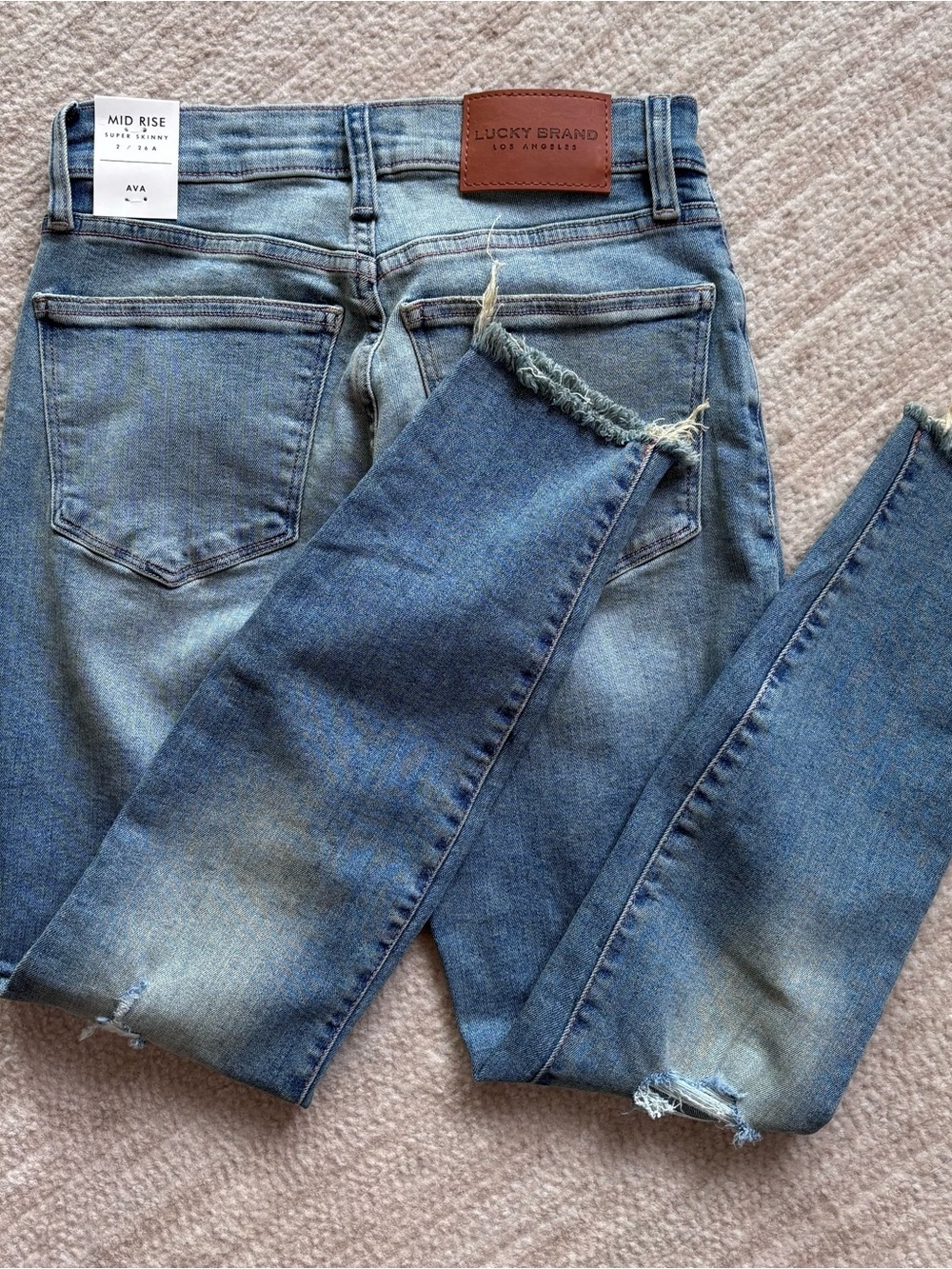 Lucky Brand Mid Rise Super Skinny Ava Light Blue Frayed Hem Crop Jeans